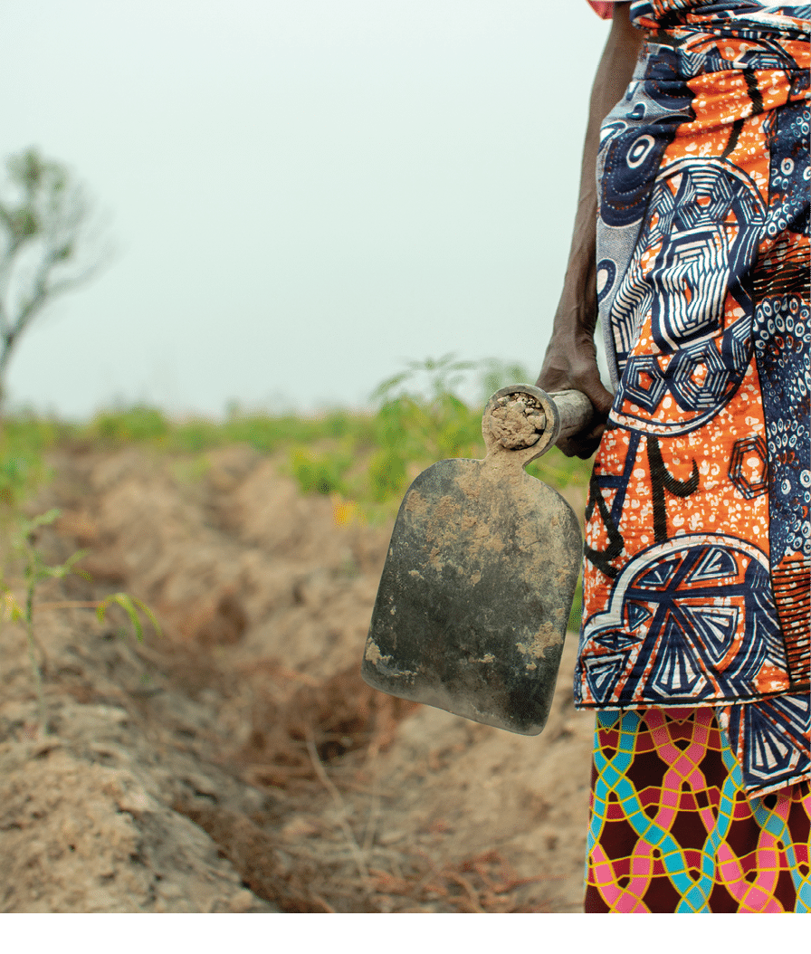 Local farmer dressed in colorful african cloths, Angola 2019